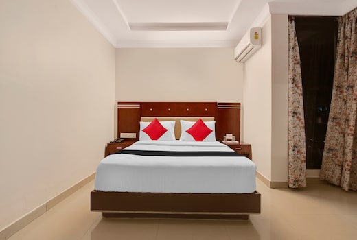 Capital O Elegant Amethyst Business Hotel Near Ragigudda Sri Prasanna Anjaneyaswamy Temple