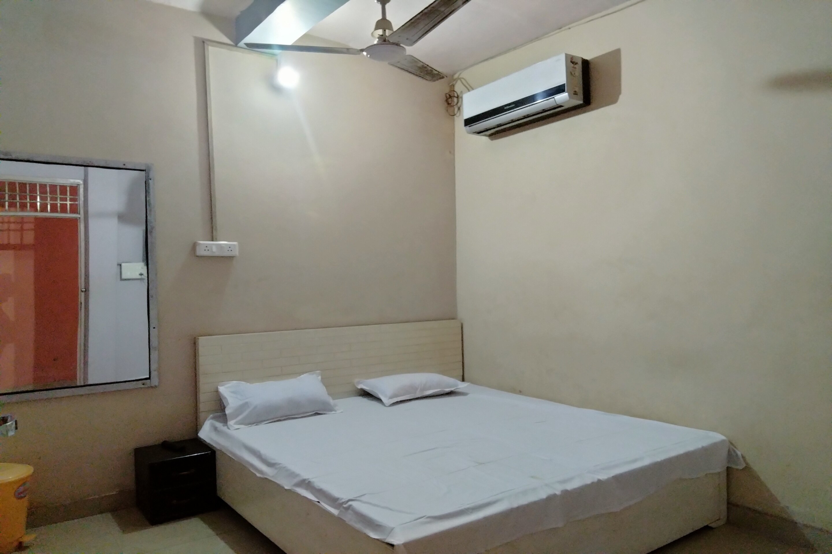 Hotel O Home Madhushala - Tap to explore photos