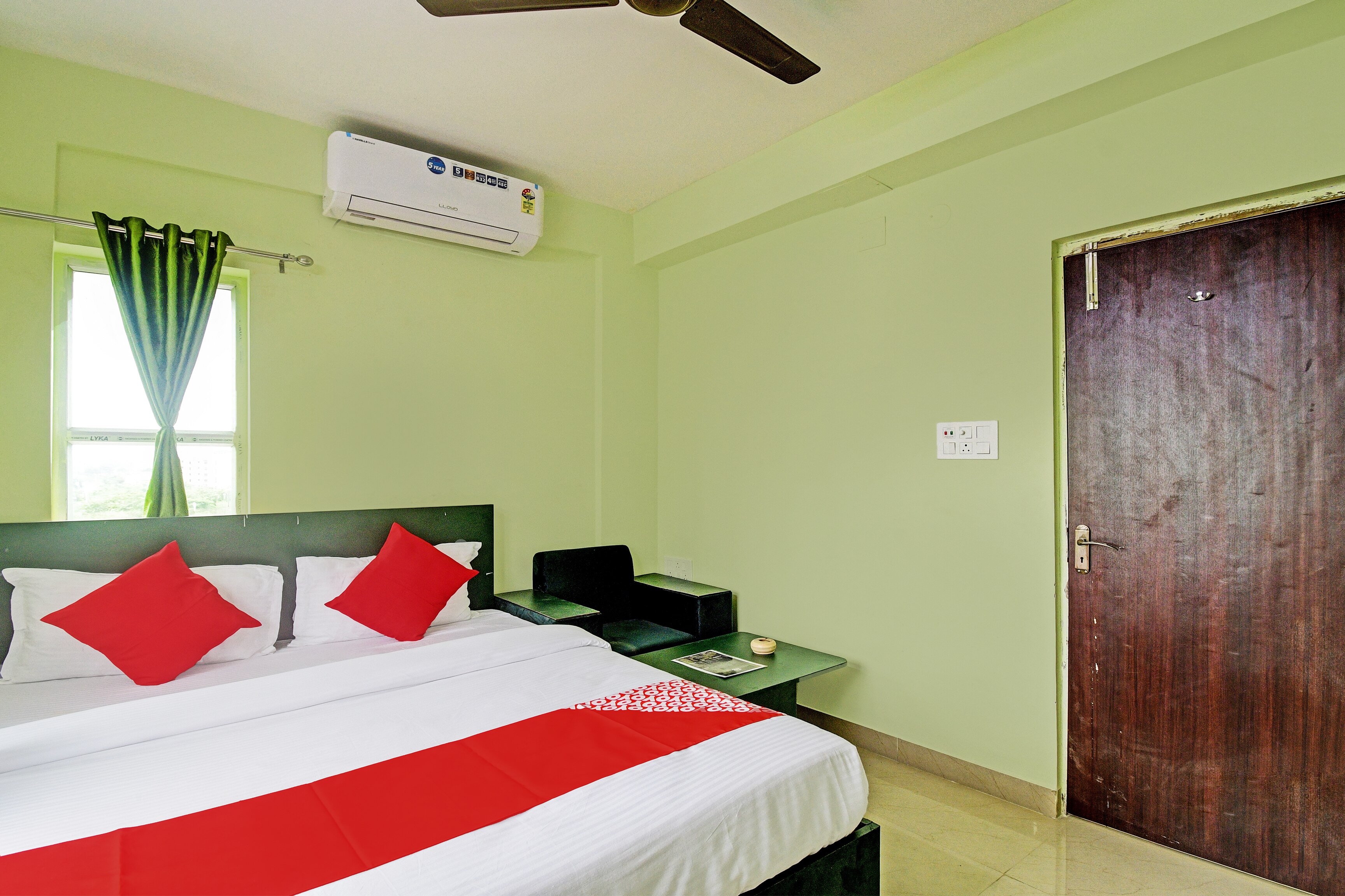 Hotel O Night Quine Guest House - Tap to explore photos