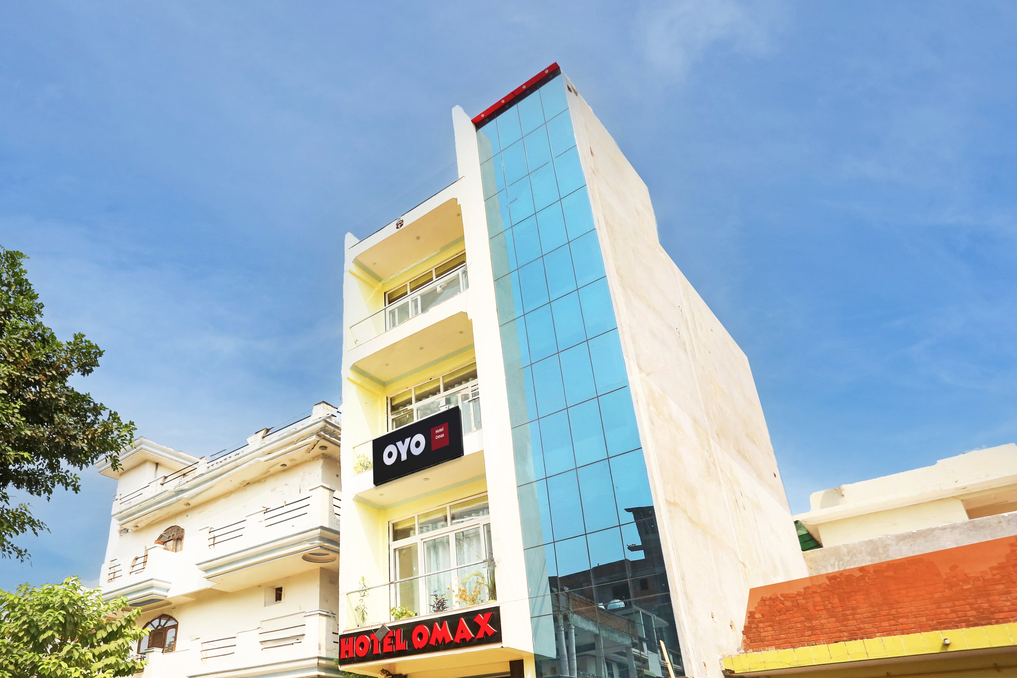 OYO 818850 Hotel Omex - Tap to explore photos
