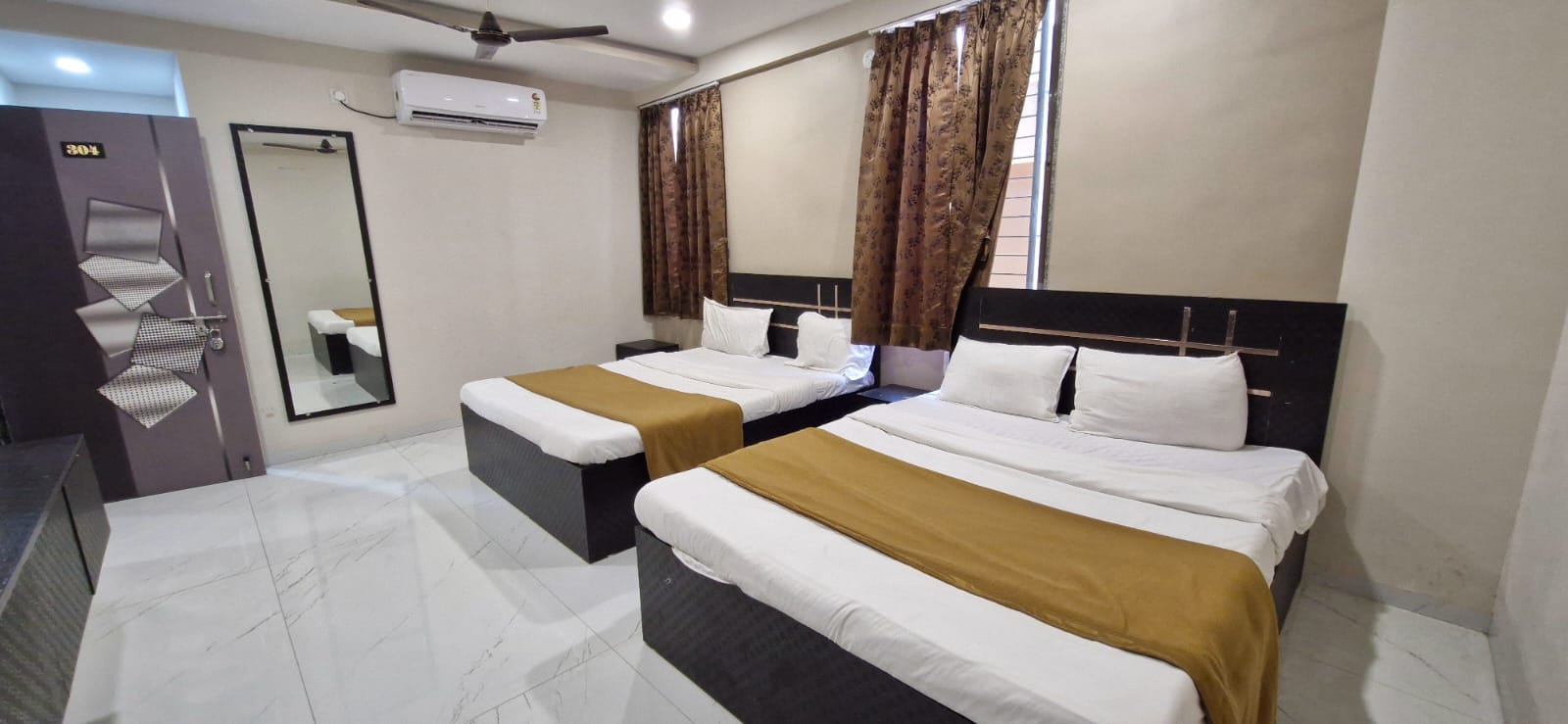 HOTEL RAJKAMAL, Shirdi - Tap to explore photos