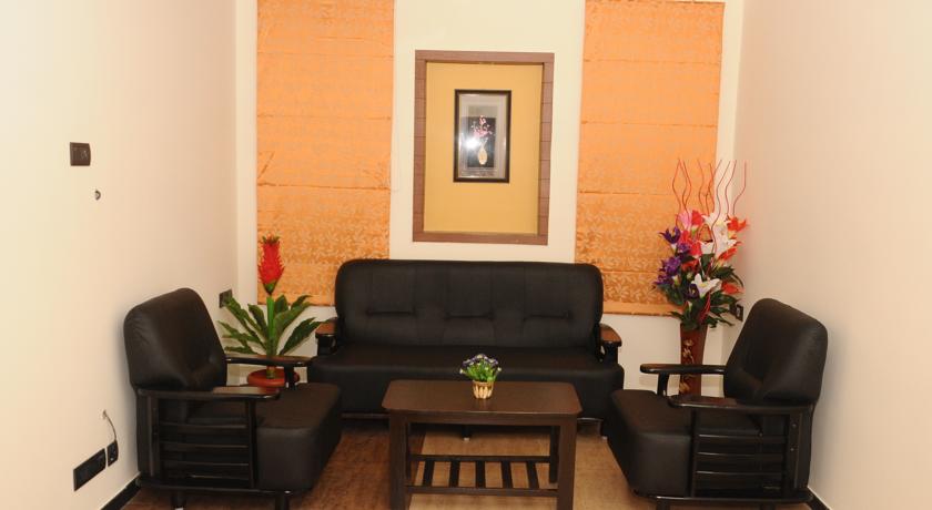 comforts stays service apartment - Tap to explore photos