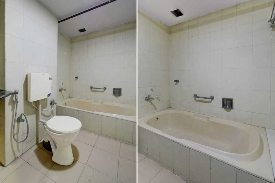 SPOT ON Surya Luxury Rooms - Tap to explore photos
