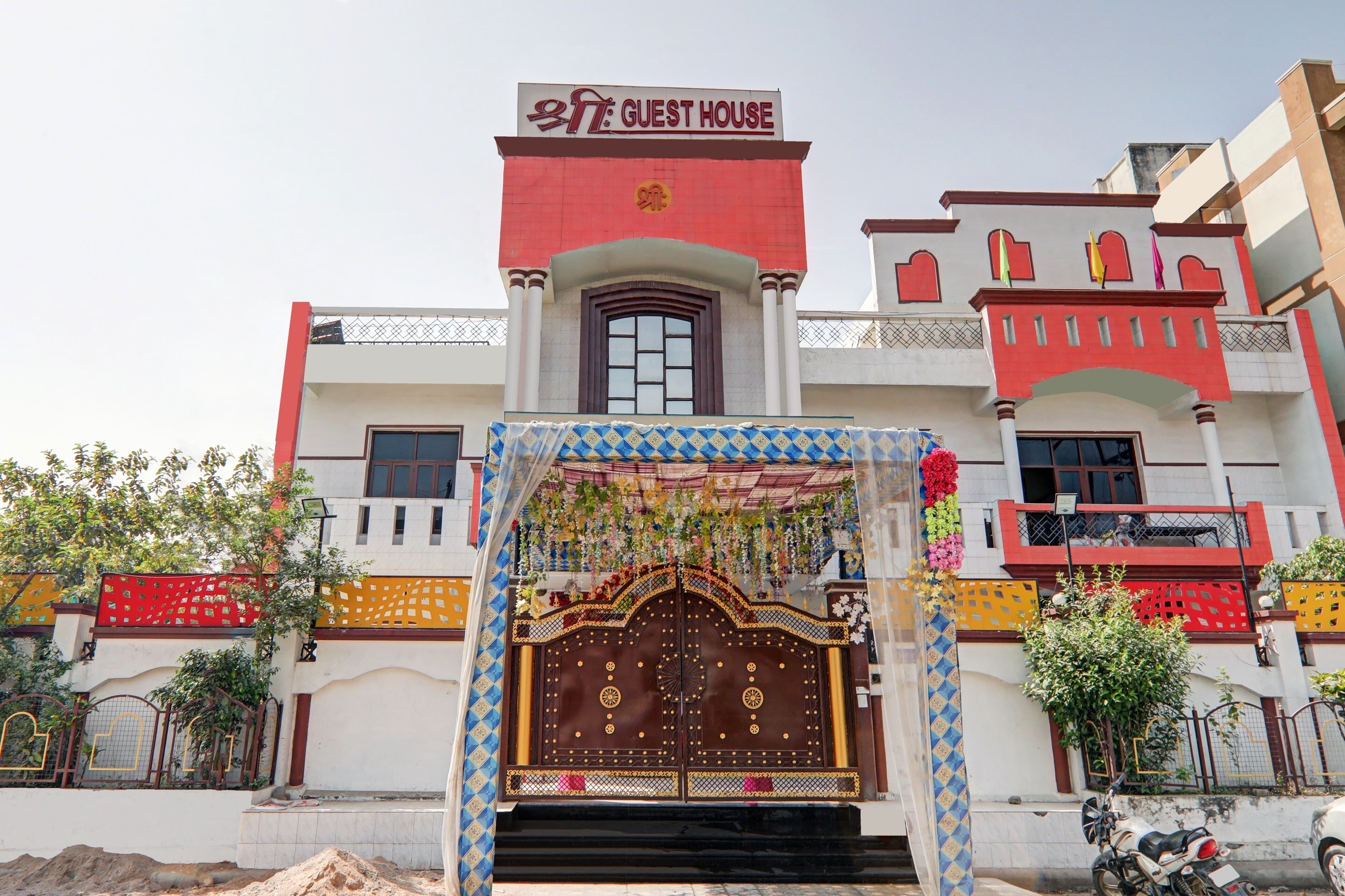 Capital O Hotel Shree - Tap to explore photos
