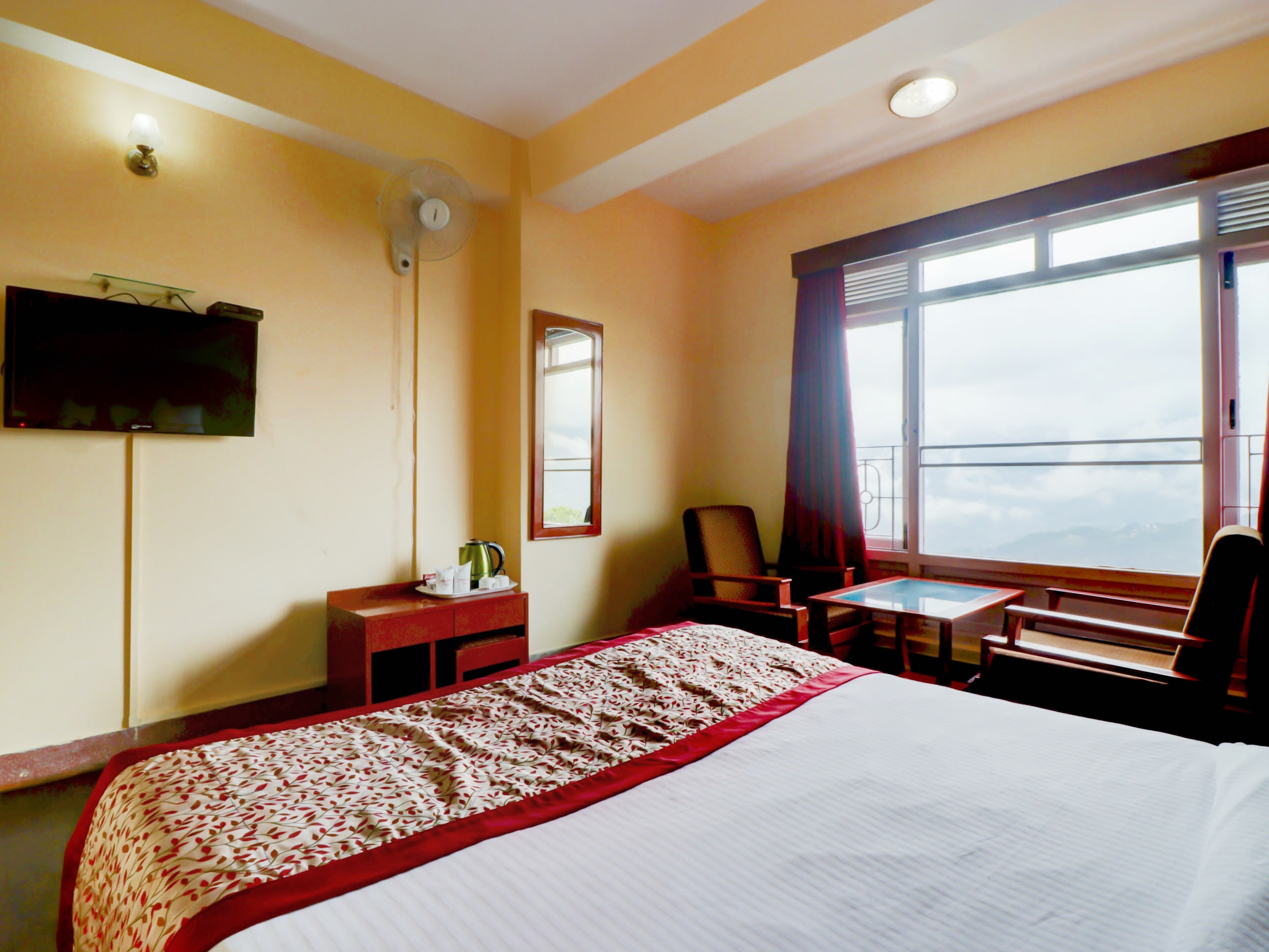 Jain Group Sikkim Continental (5 min walk to m.g marg) - Tap to explore photos