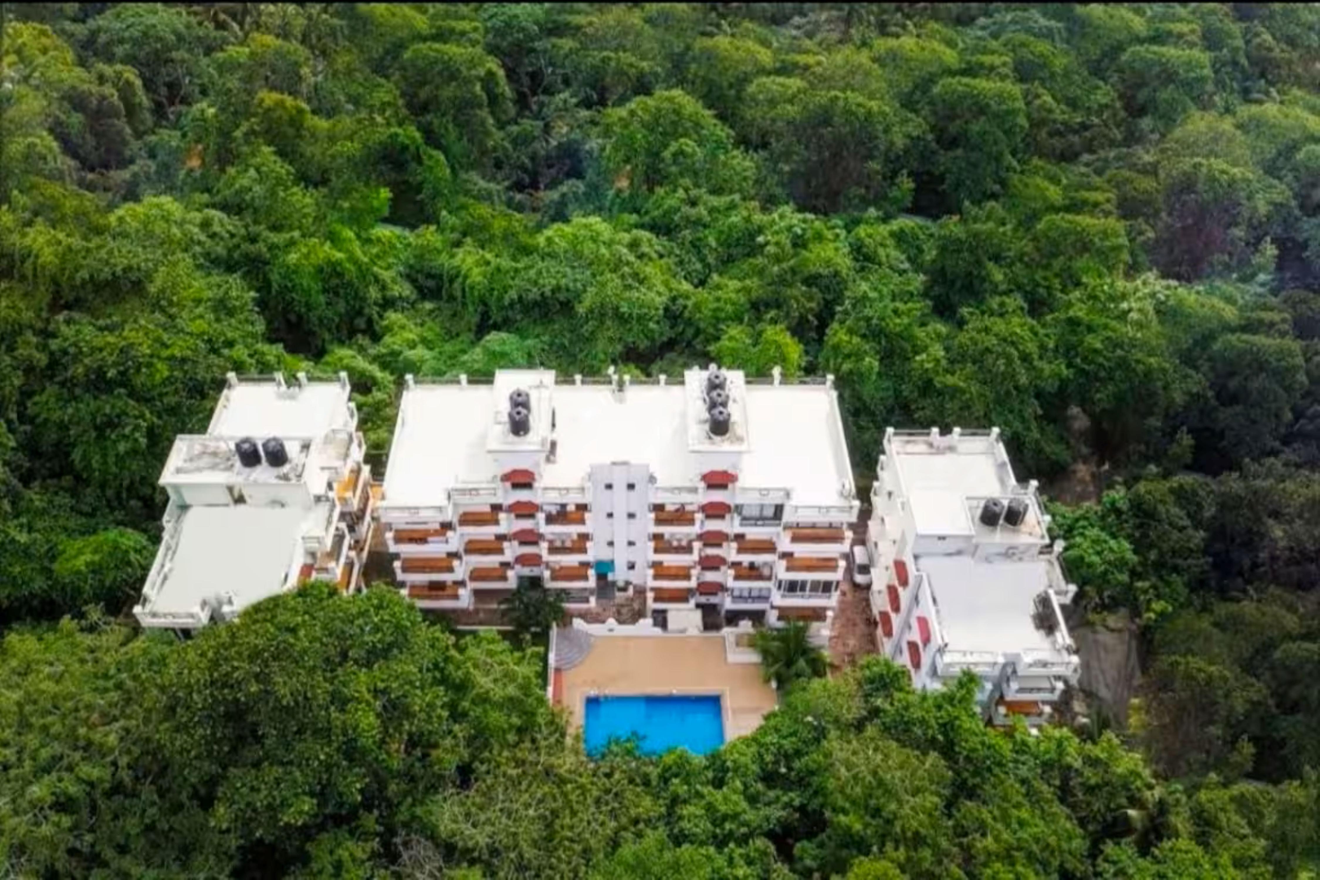 Humming woods 2bhk Apartment - Tap to explore photos