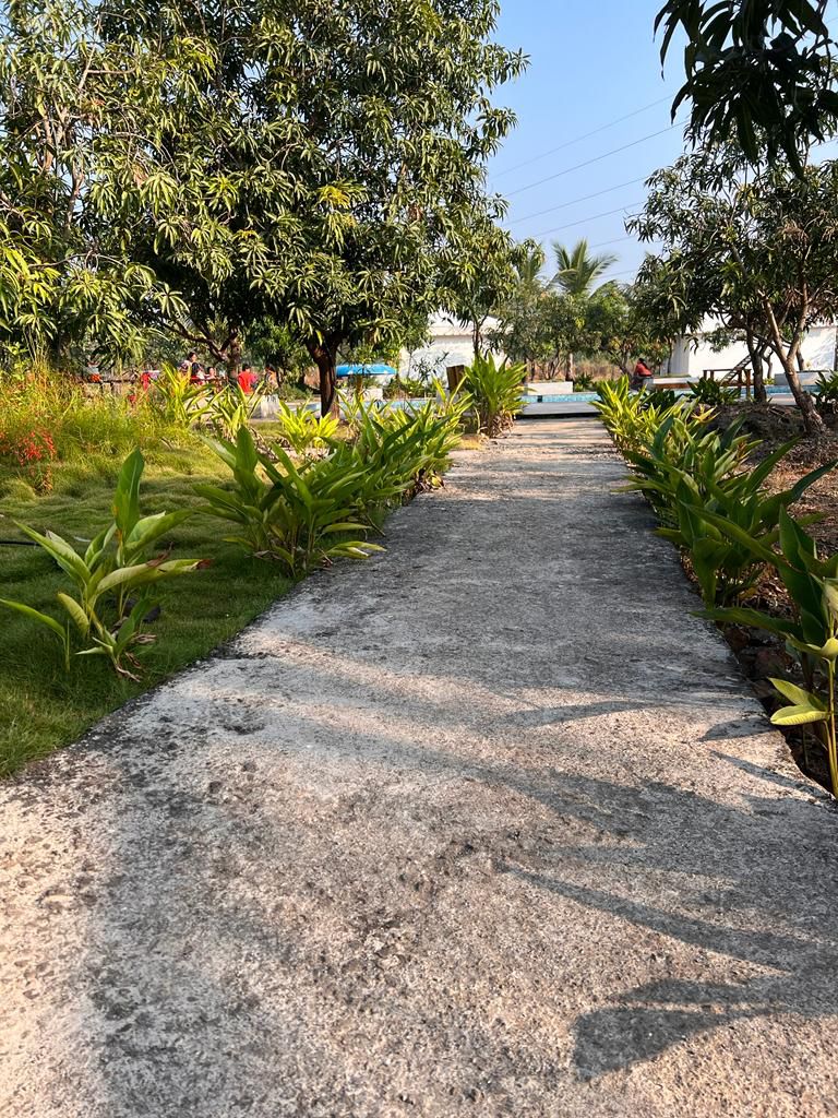 Navghar Nature Village Resort and Team. - Tap to explore photos