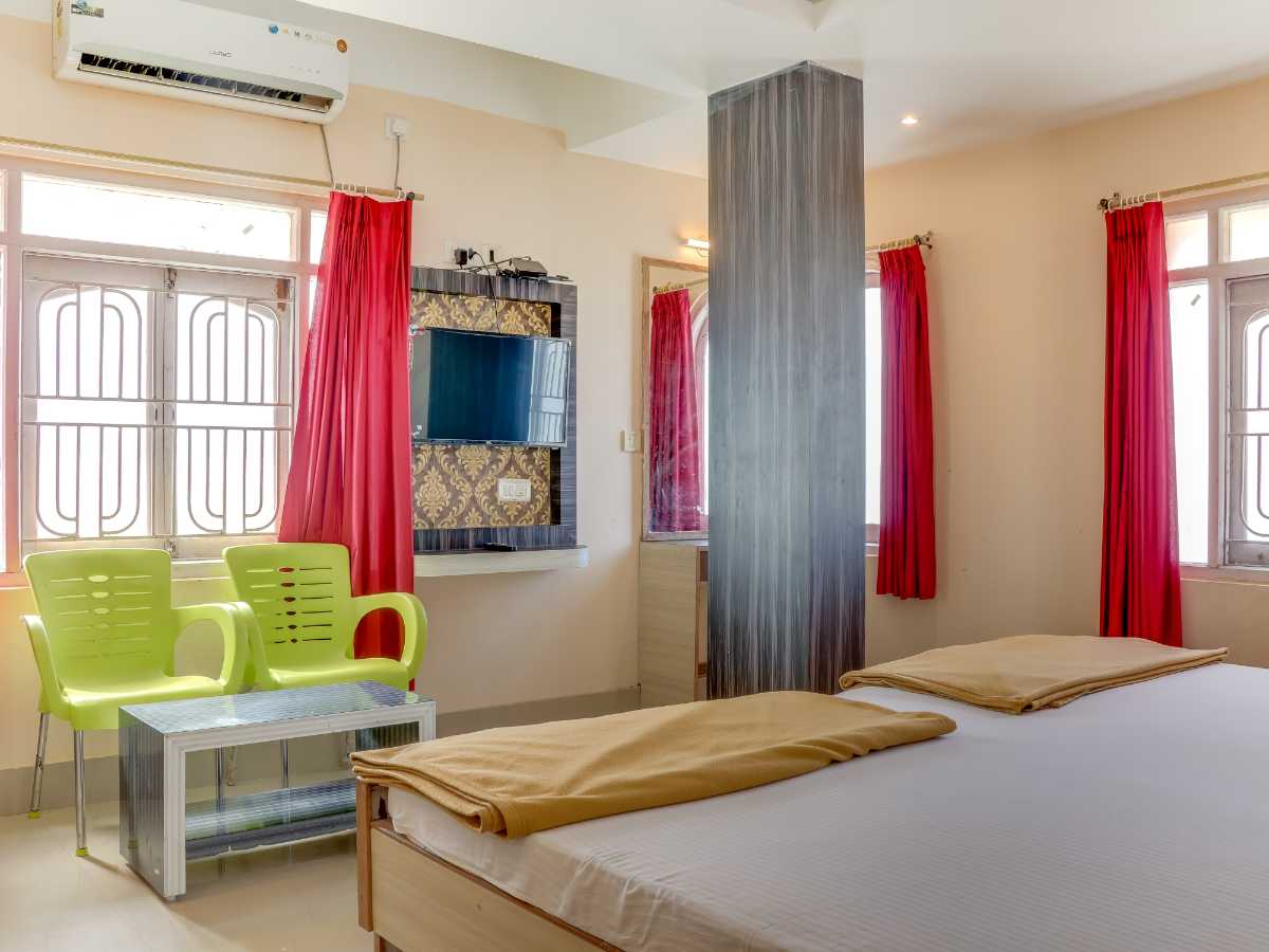 Hotel DharmaJyoti - Tap to explore photos