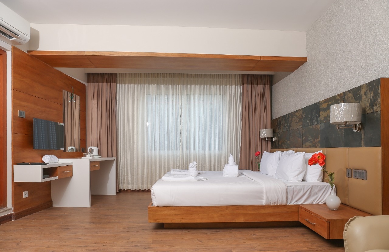 Welcare Business Hotel - Tap to explore photos