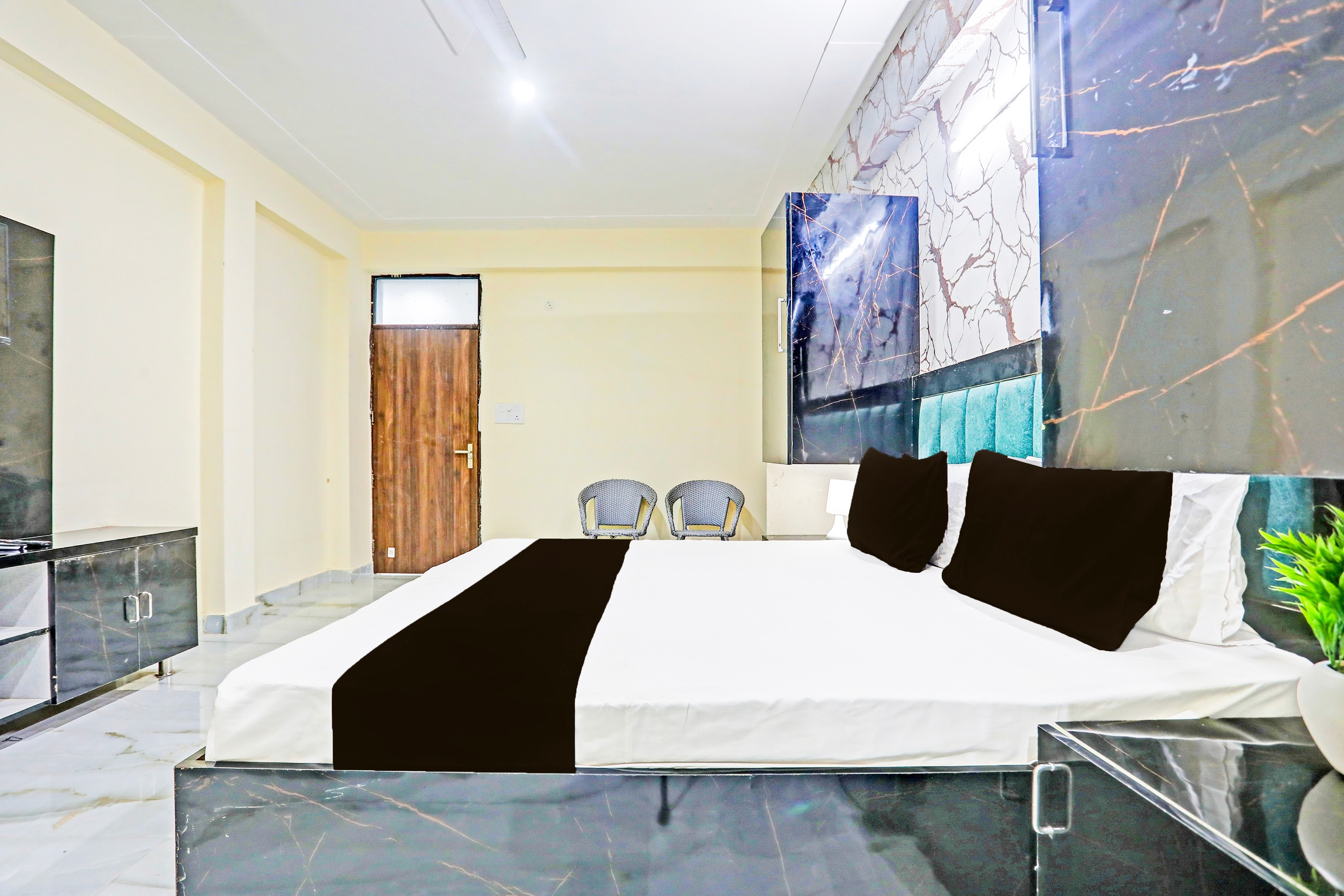 Hotel O AV HOMES U BLOCK - Tap to explore photos
