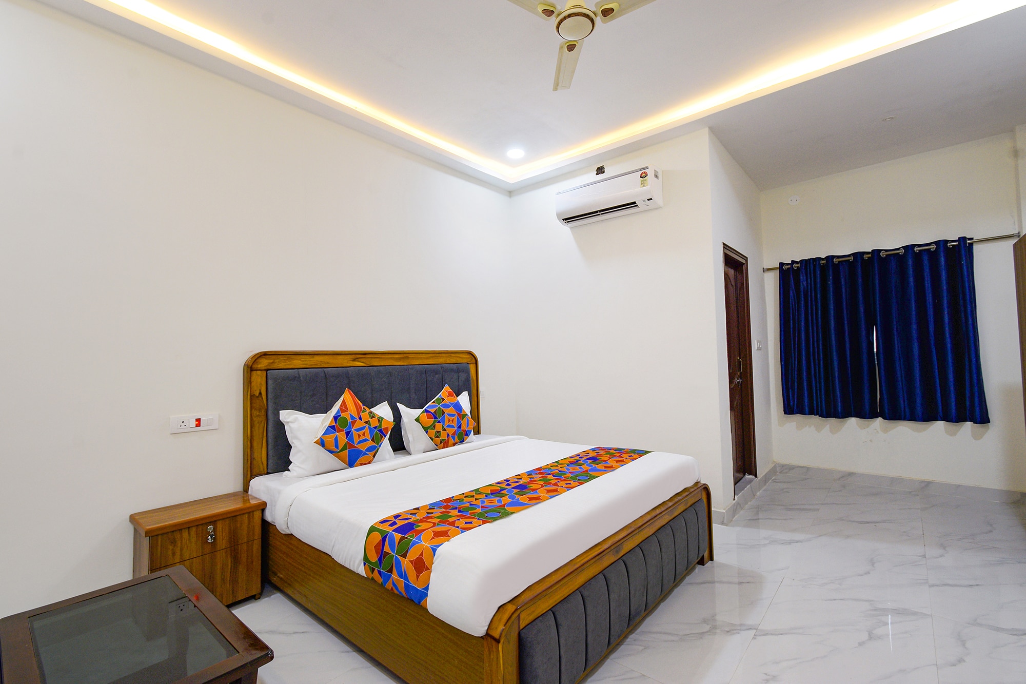 FabHotel RR Living Grand- Nr Shivalayam Temple-Manikonda - Tap to explore photos