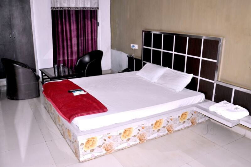 Atithi Hotel and Guest House - Tap to explore photos
