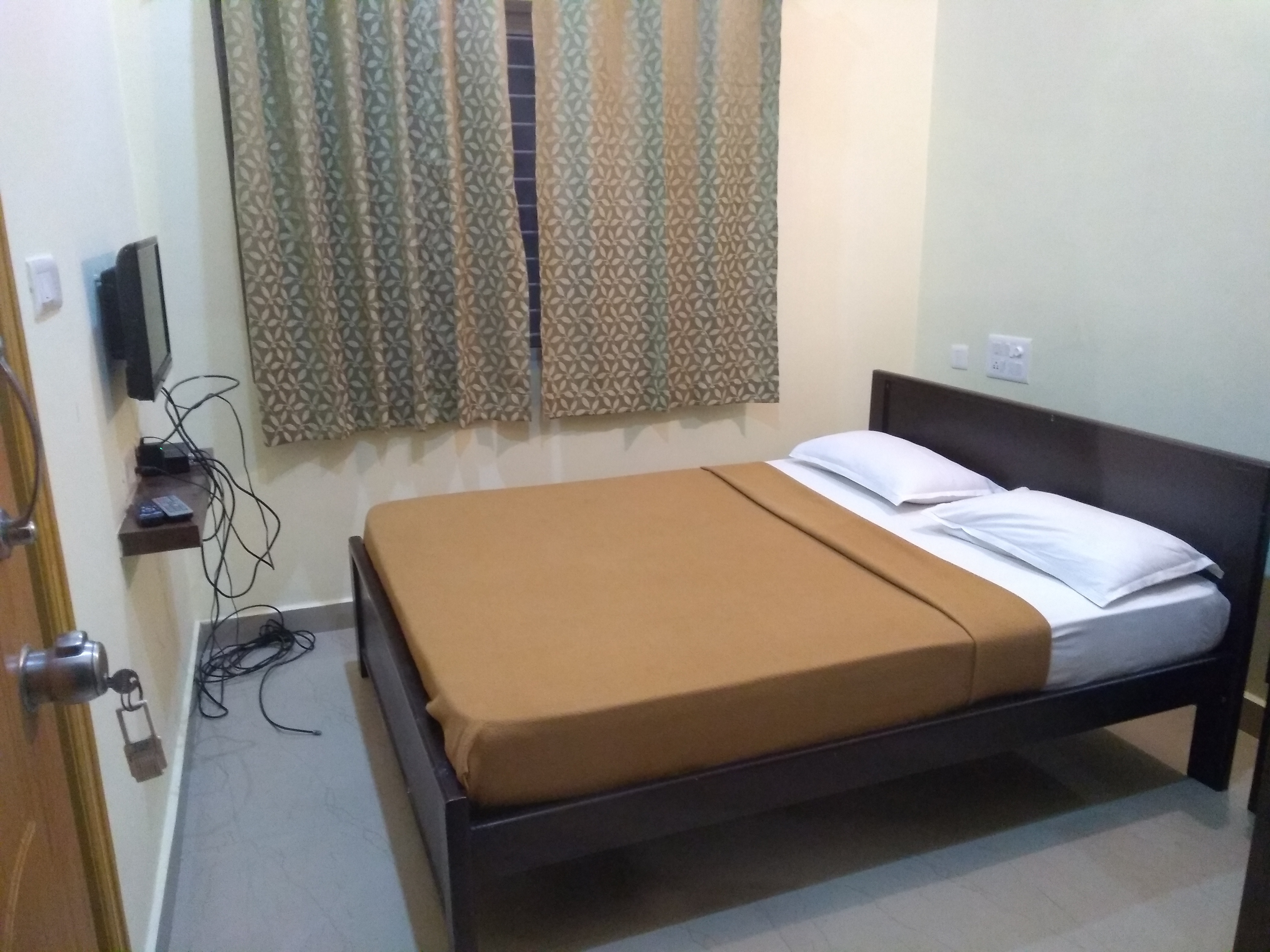 Royal Suvarna Comforts - Tap to explore photos