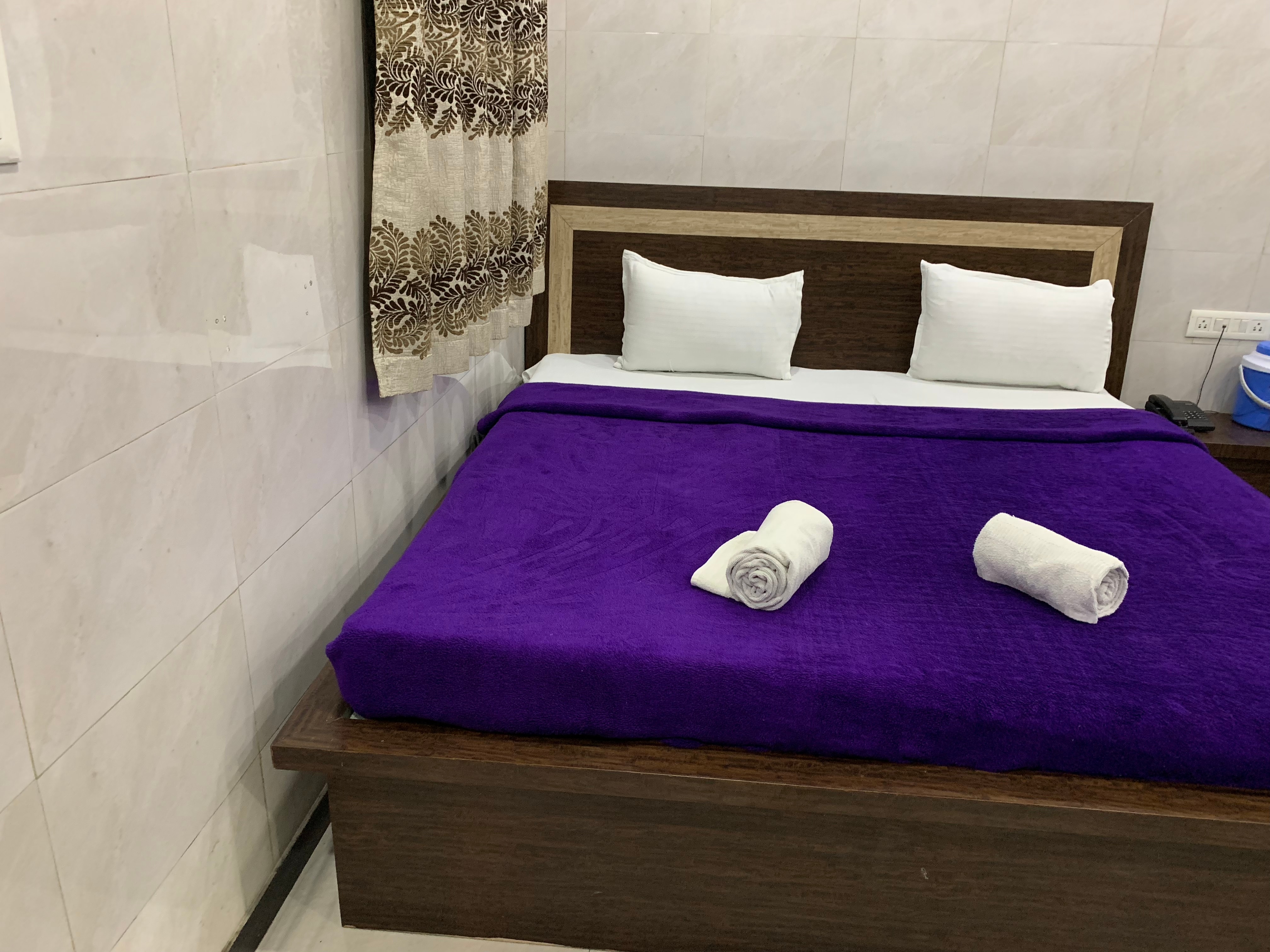 Hotel Bombay Darbar - Tap to explore photos