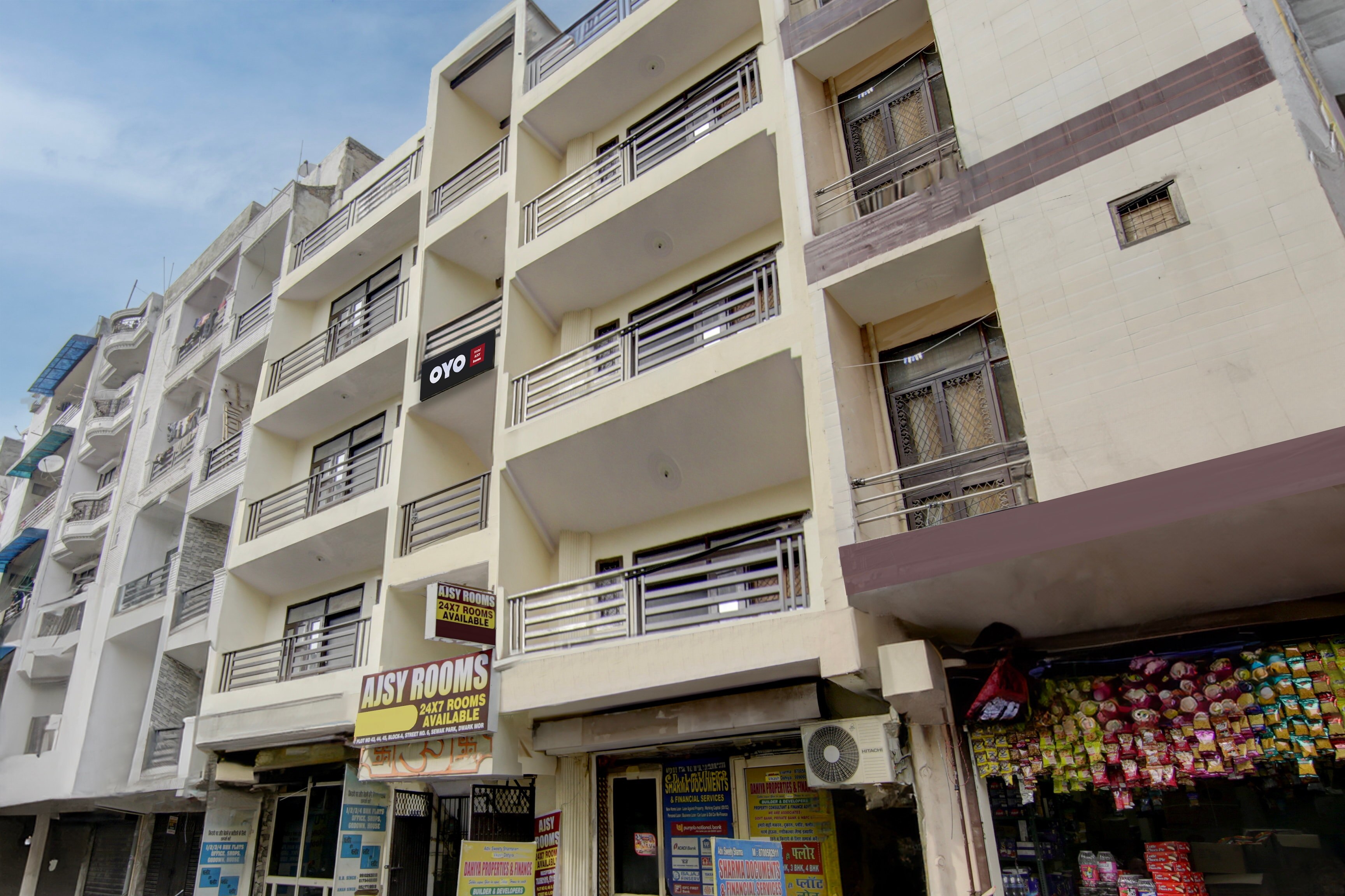 Hotel O AJSY Rooms - Tap to explore photos