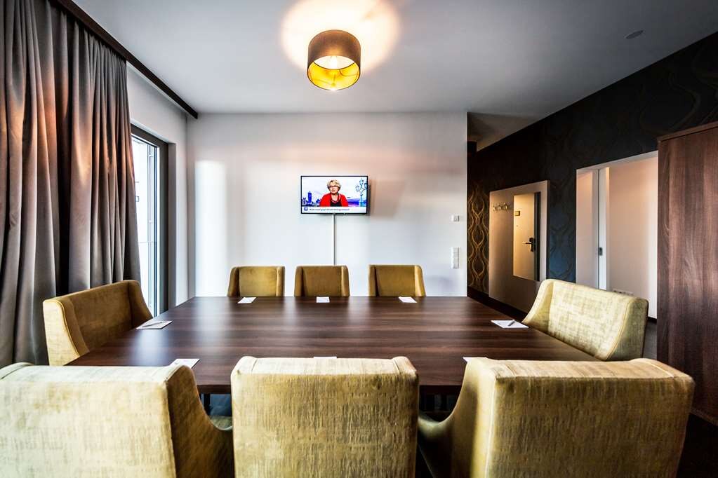 Best Western Plus Royal Suites - Tap to explore photos