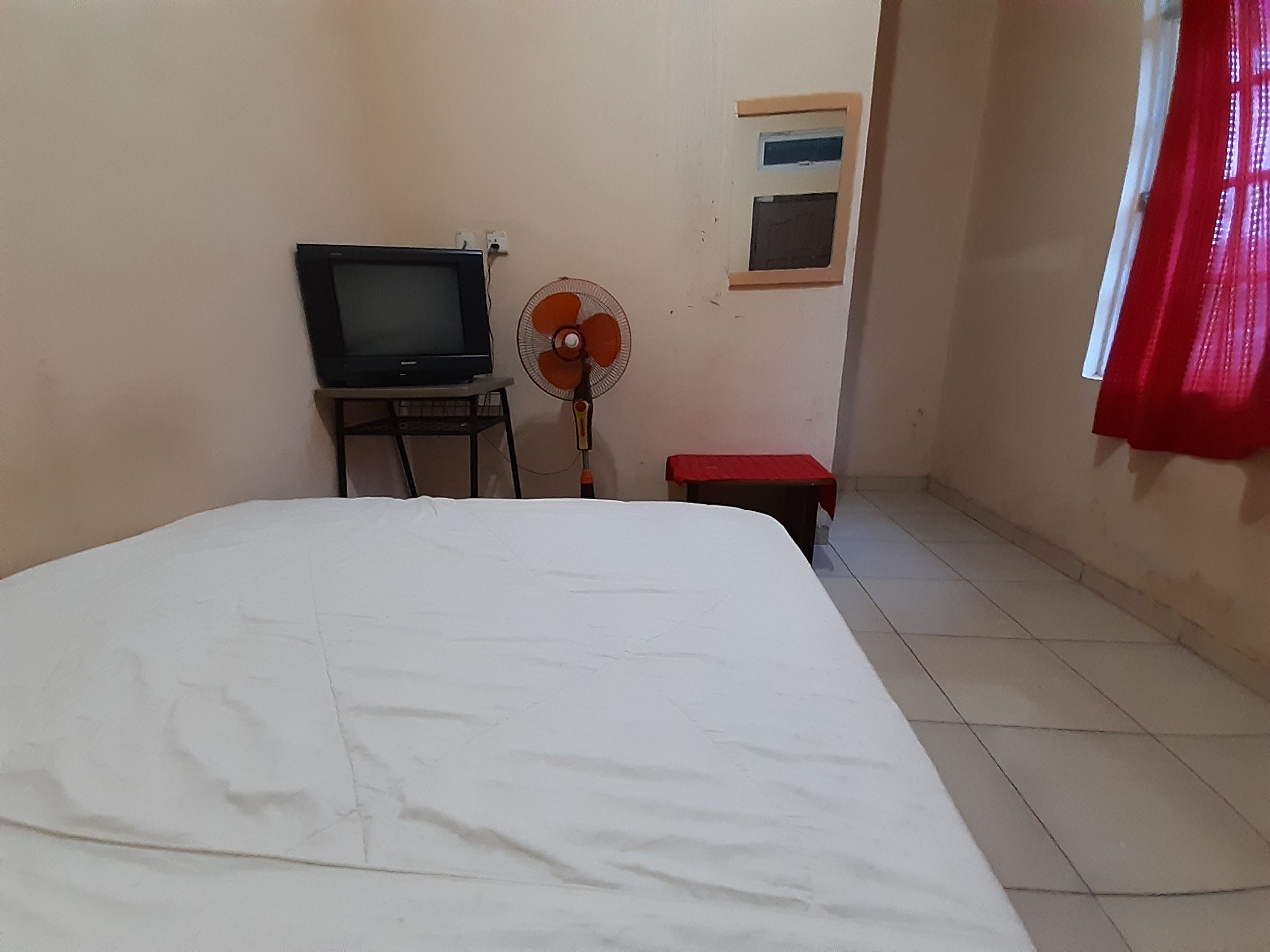 SPOT ON 93776 Intan Homestay - Tap to explore photos