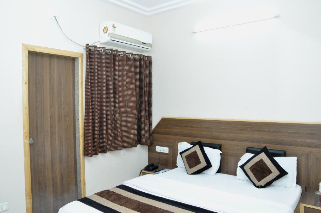 Hotel Nand Nandan - Tap to explore photos