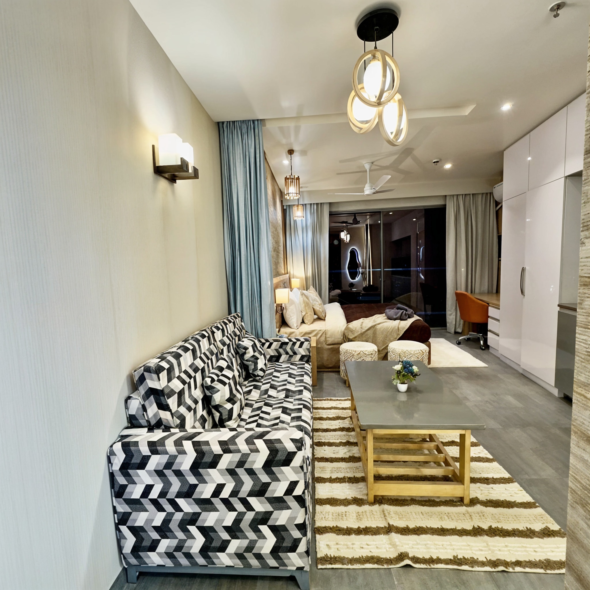 Elysium |Studio Apt|35th Floor| Noida|By Homeyhuts - Tap to explore photos