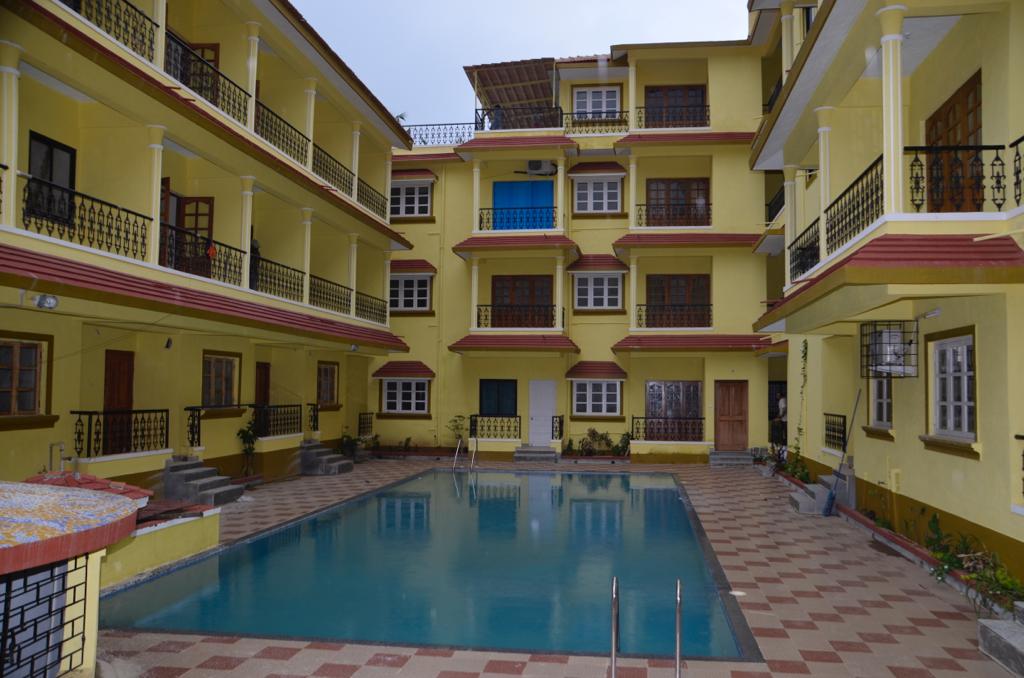 Candolim Palms Service Apartments - Tap to explore photos