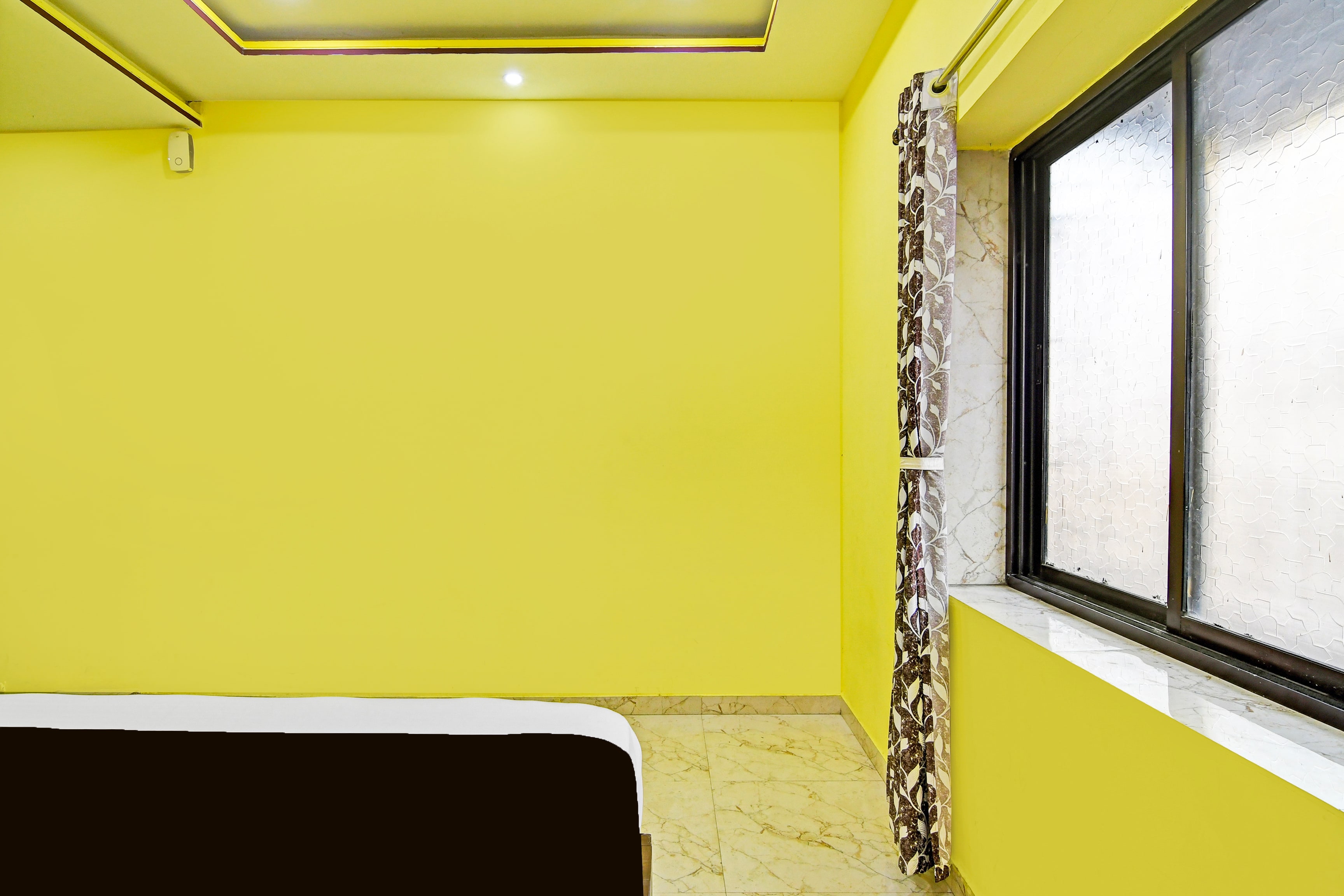 Hotel O Marquis Guest House - Tap to explore photos