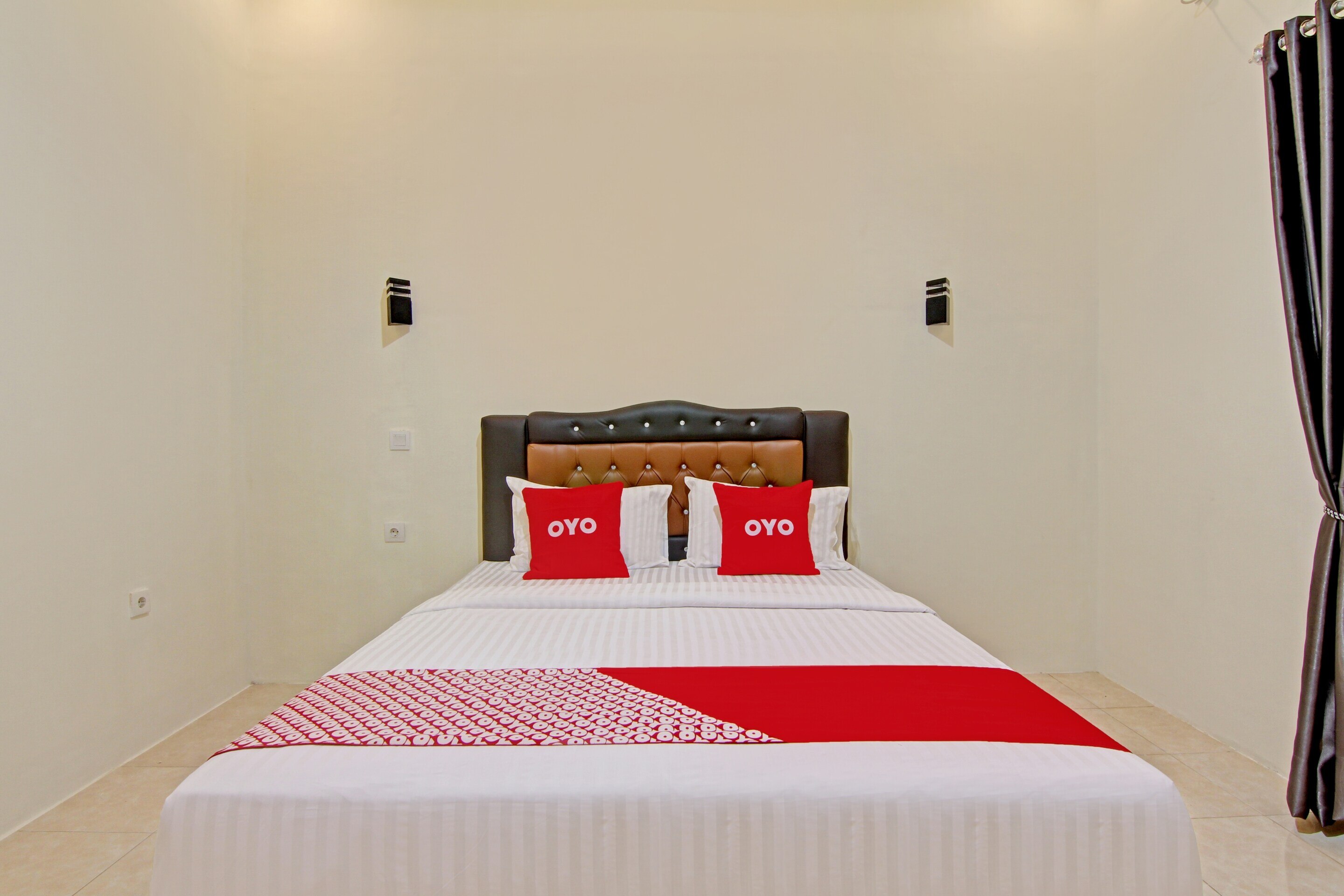 Capital O 90643 Suri Guest House Syariah - Tap to explore photos
