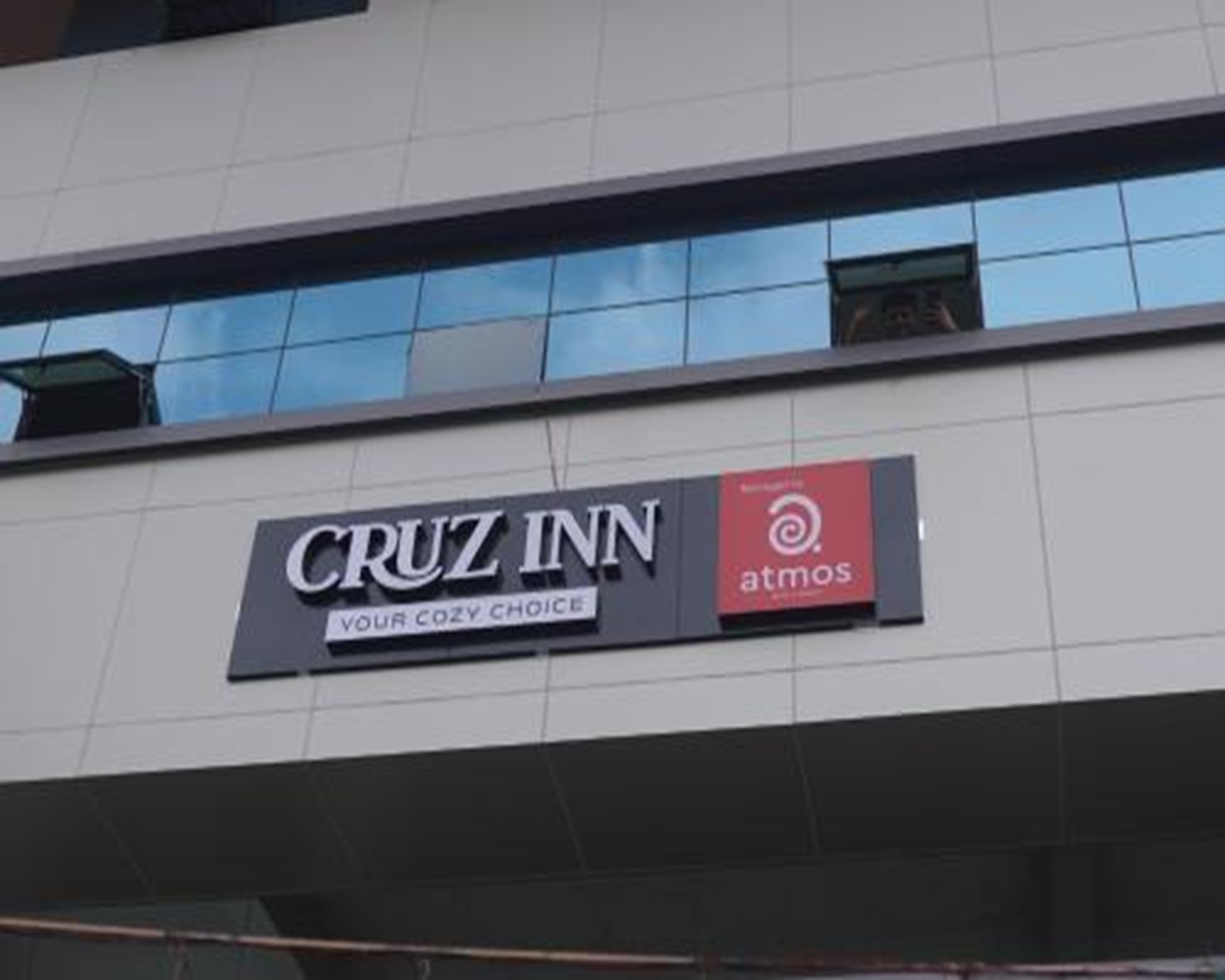 Cruz Inn Calicut - Tap to explore photos