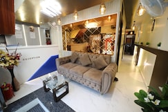 NM Hotel , Near Kokilaben Ambani Hospital, Mumbai