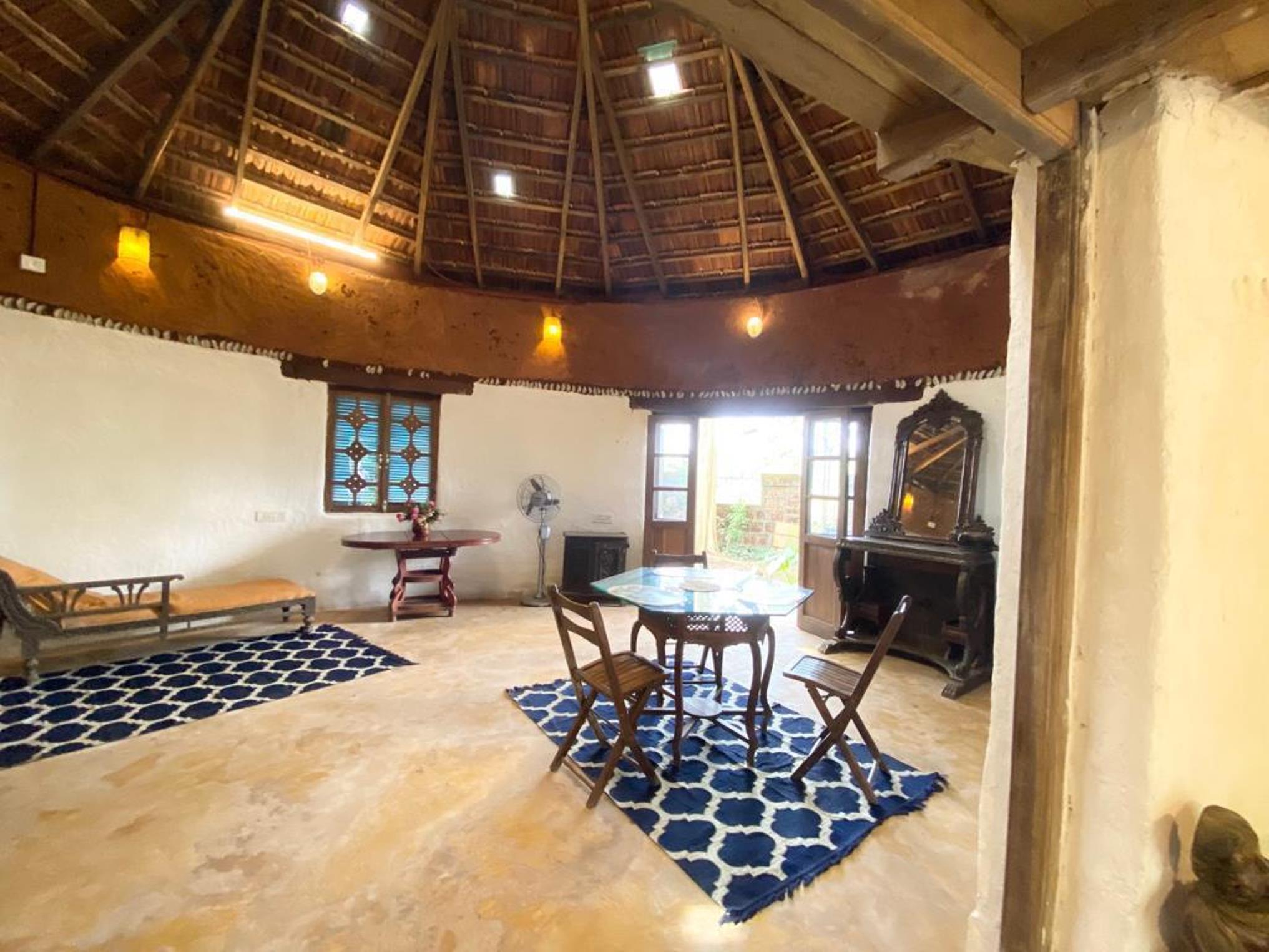 Field View 1 BHK Earth House - Tap to explore photos