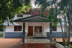 Tranquil villa-2 Bedrooms |Lake view by Homeyhuts, Muvattupuzha