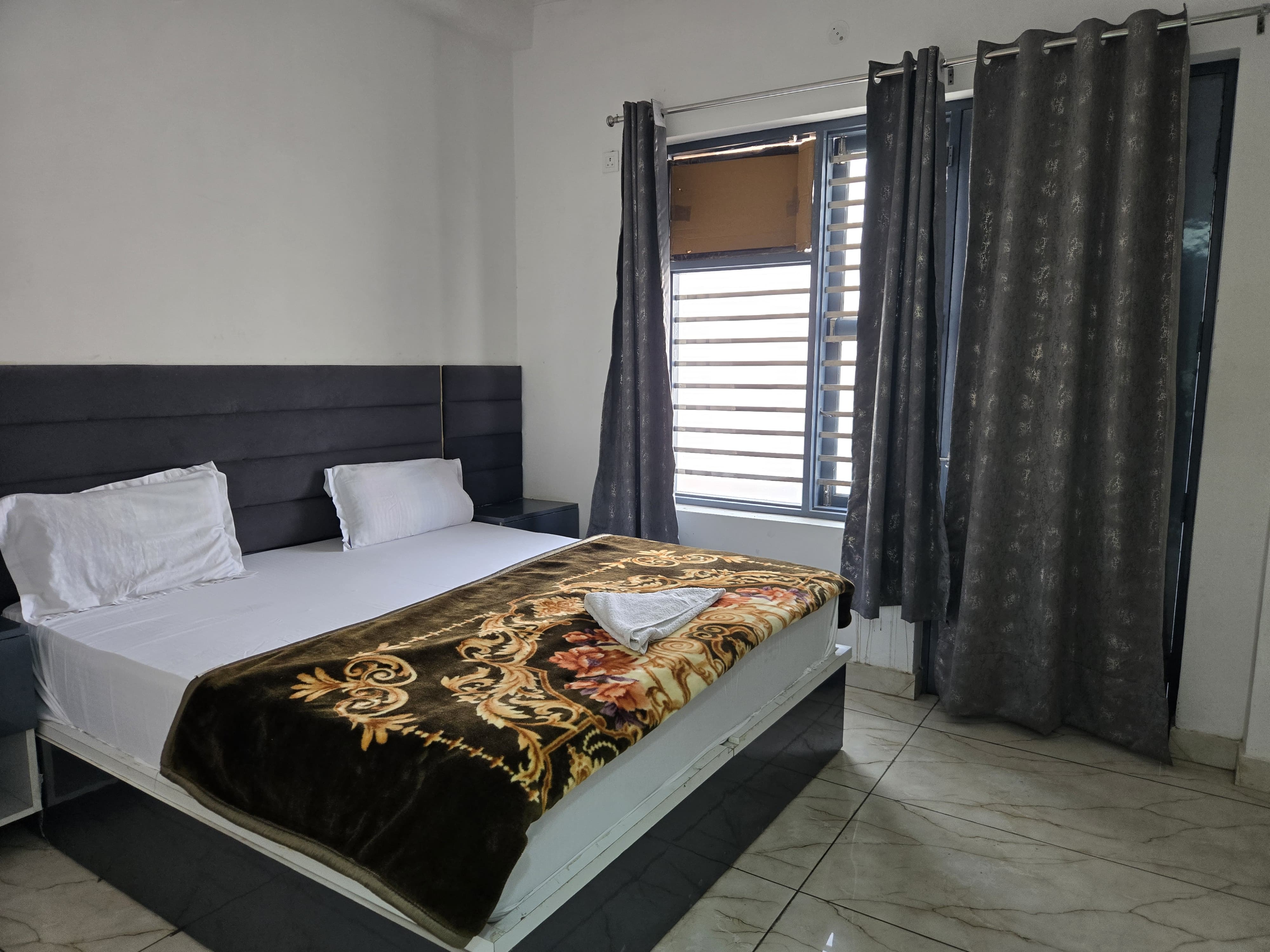 Hotel HR Residency - Tap to explore photos
