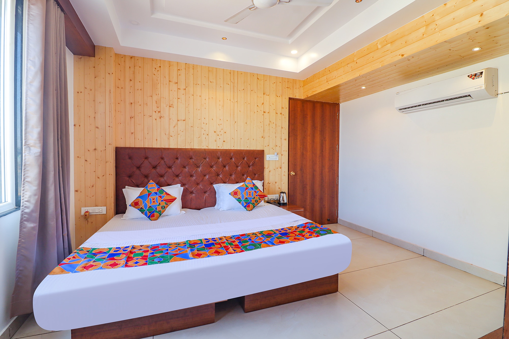 FabHotel Grand Arya - Tap to explore photos