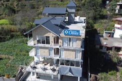 Gezellig Inn - Hotel Oasis Manali, Manali