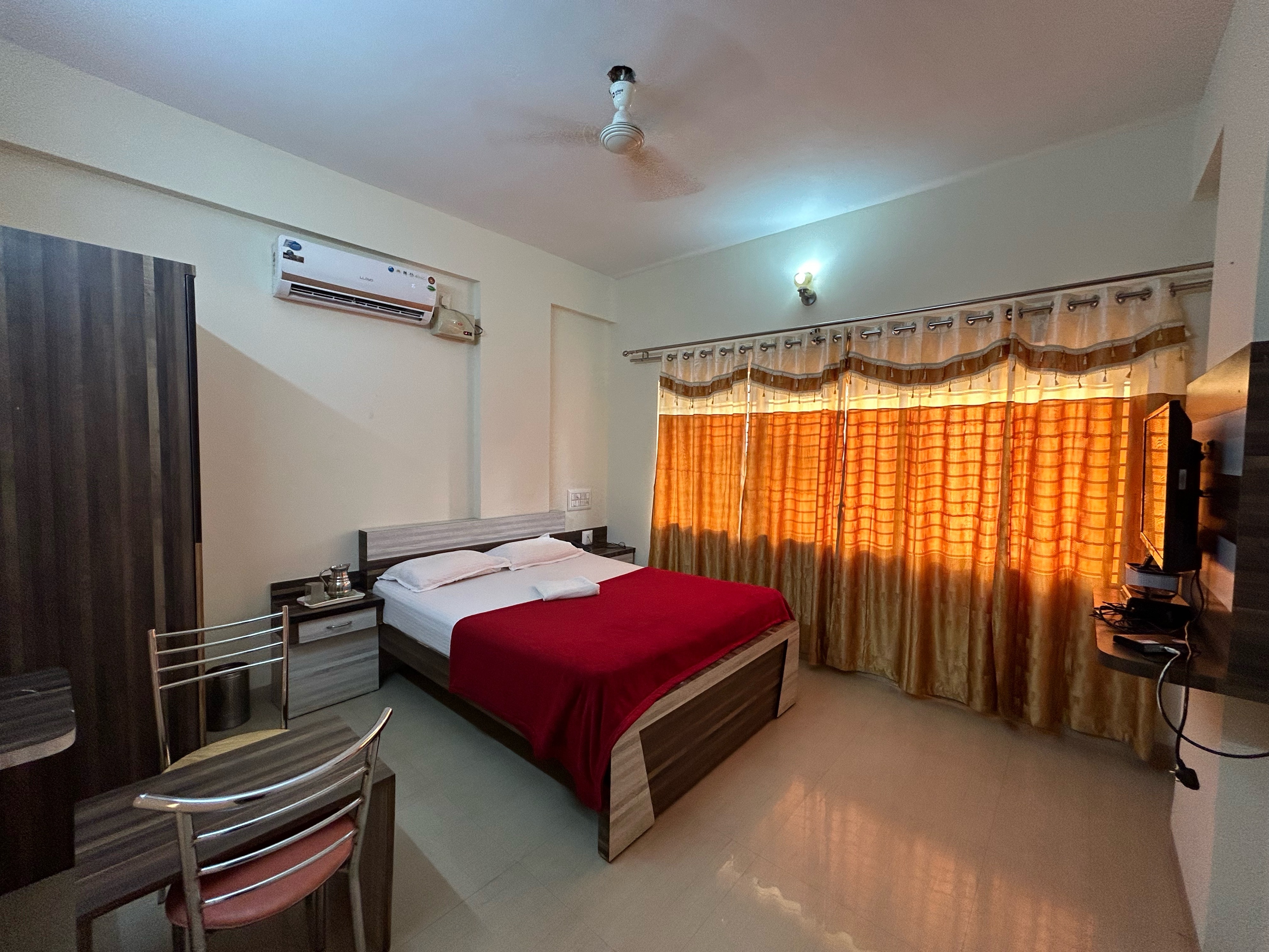 Hotel Sai Skanda - Tap to explore photos