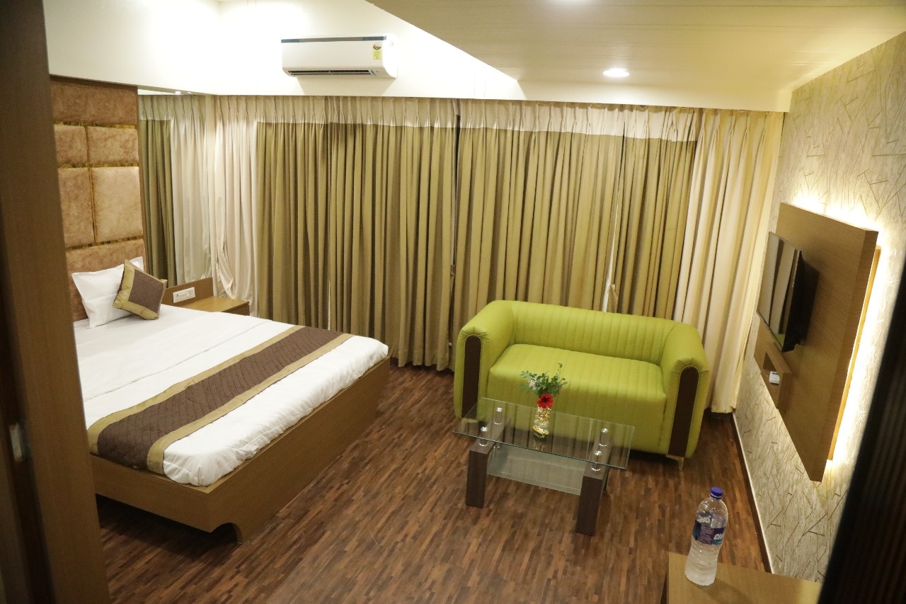 M Residency Hotel - Tap to explore photos