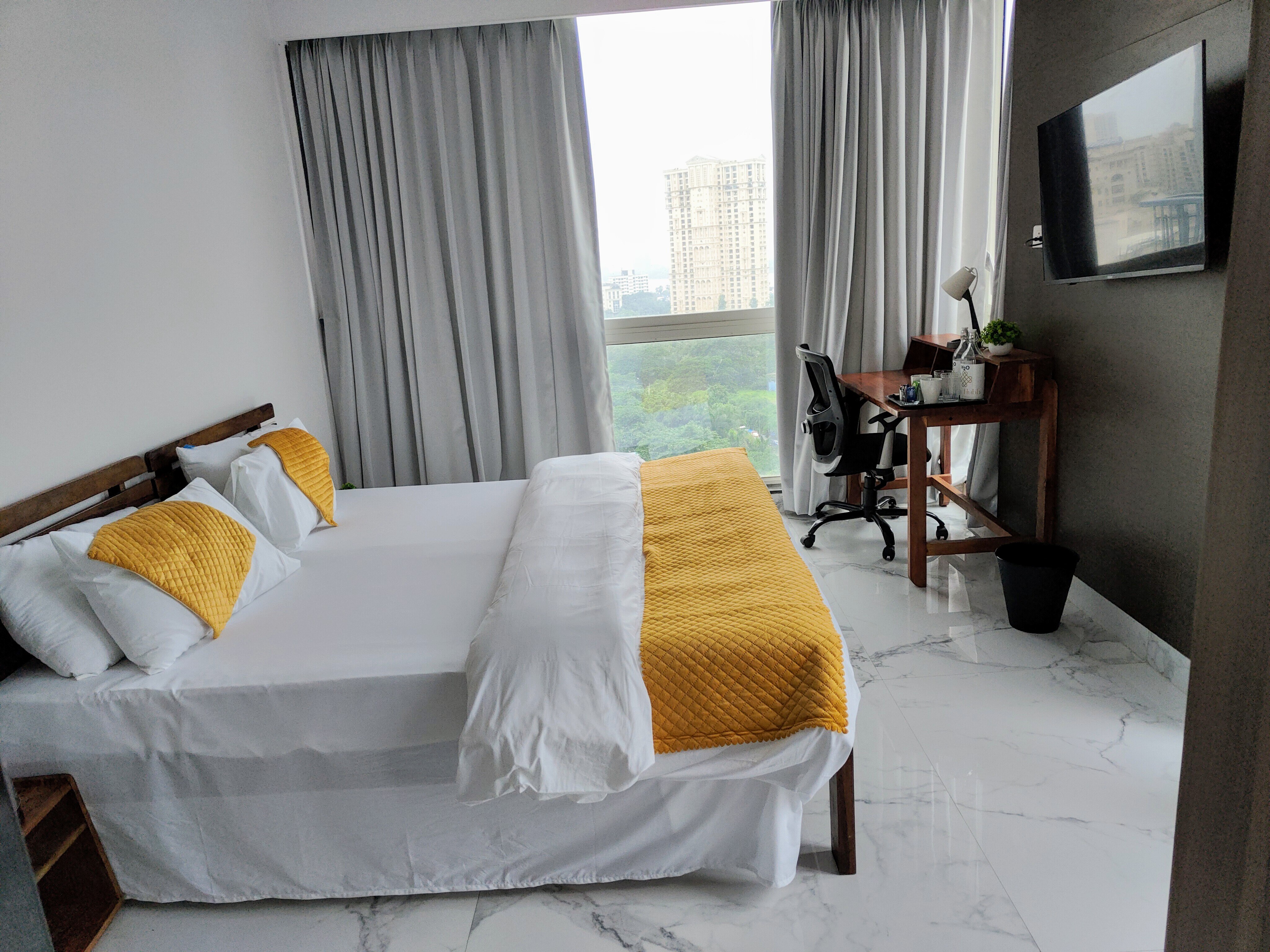 StayHubb Service Apartment - Tap to explore photos