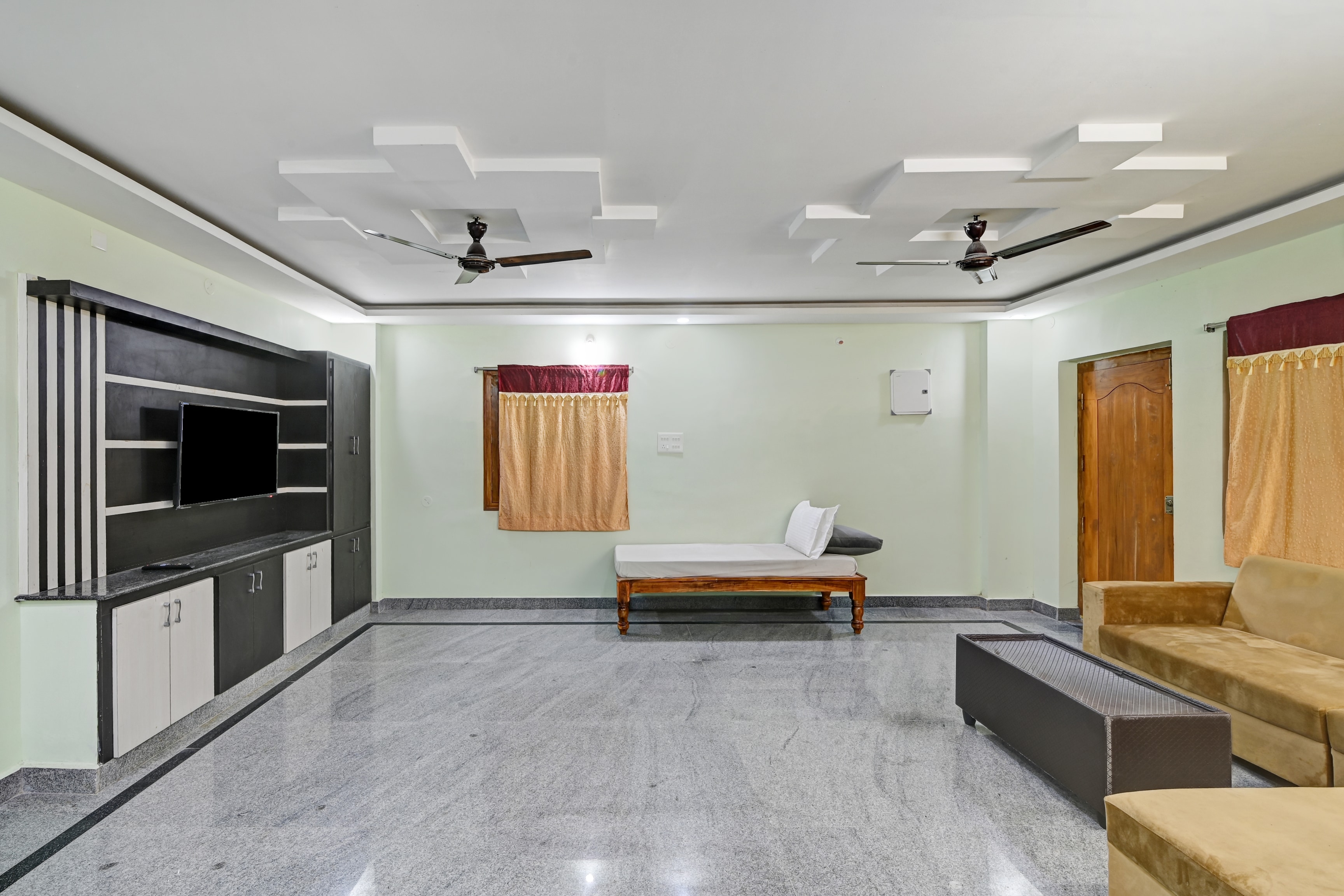 Hotel O PVS Home Stay - Tap to explore photos