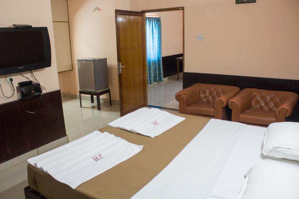 Hotel Janardana - Tap to explore photos