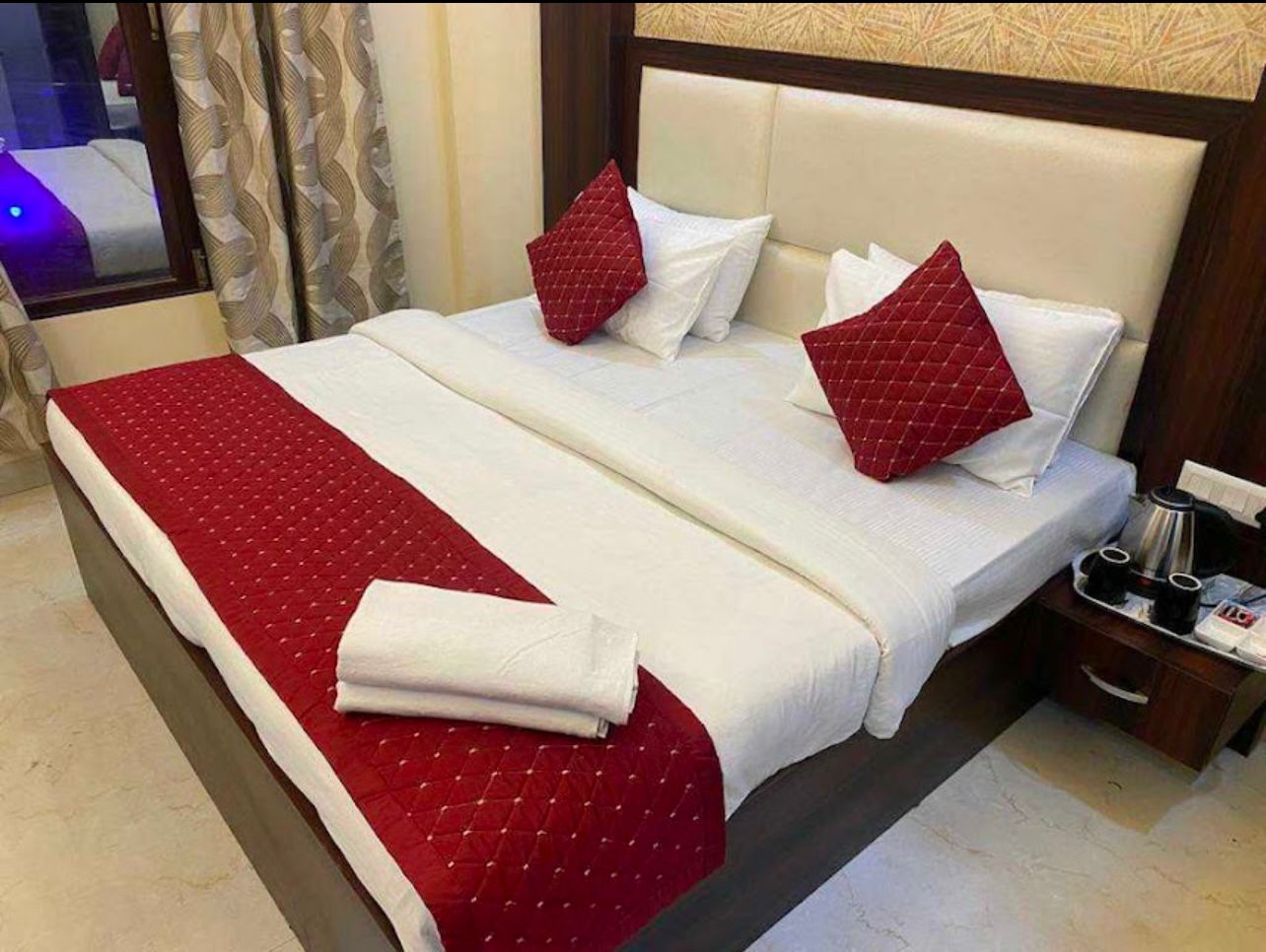 HOTEL TAJ COMFORT INN - Tap to explore photos