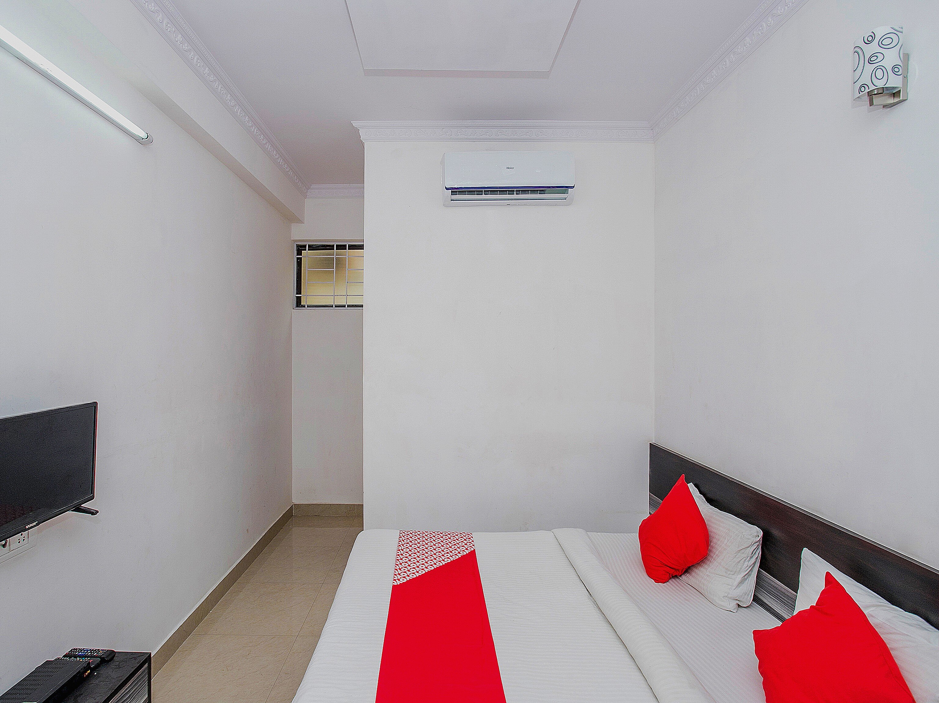 Hotel O NR Suites - Tap to explore photos