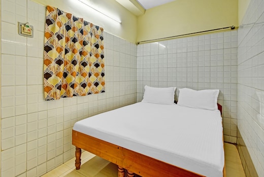 Hotel O Dream Palace Guest House Near Marina Beach