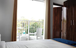 2 Deluxe Bedroom | The Golden Mango |FF| By Homeyhuts
