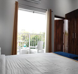 2 Deluxe Bedroom | The Golden Mango |FF| By Homeyhuts