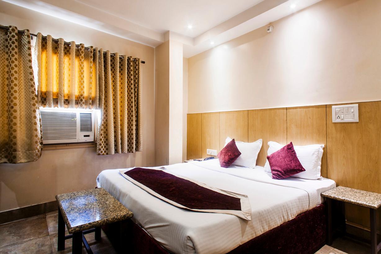 Hotel Malik Residency - Tap to explore photos