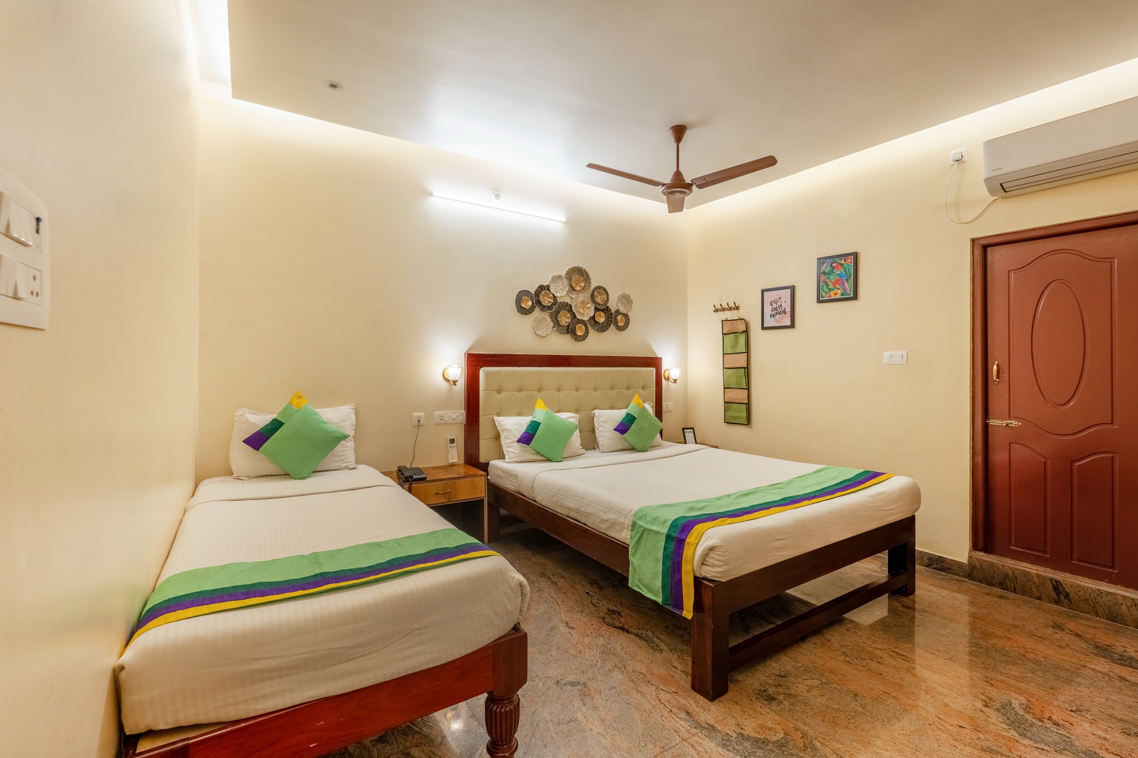 Treebo Grace Inn, 3 Min Walk From Promenade Beach - Tap to explore photos