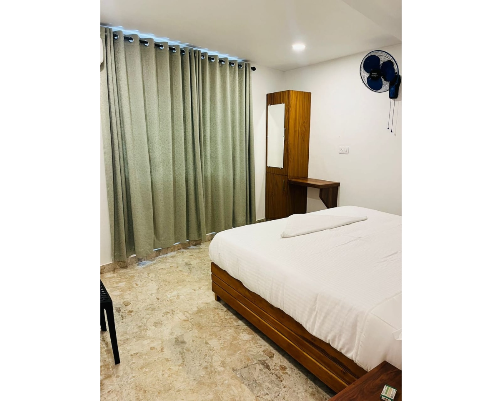 MID TOWN RESIDENCY (LODGE) - Tap to explore photos