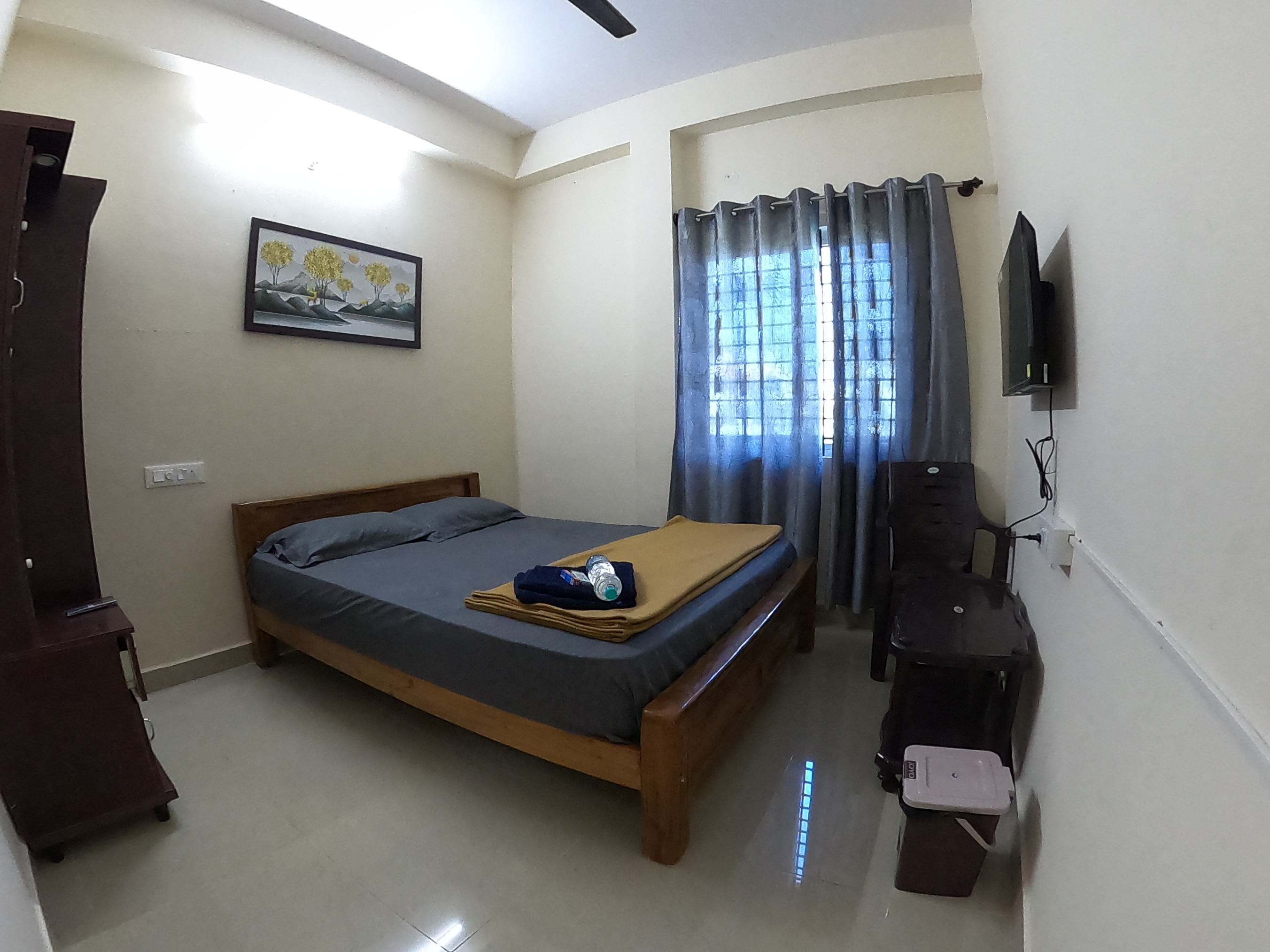Happy Holiday Inn Chikmagalur - Tap to explore photos