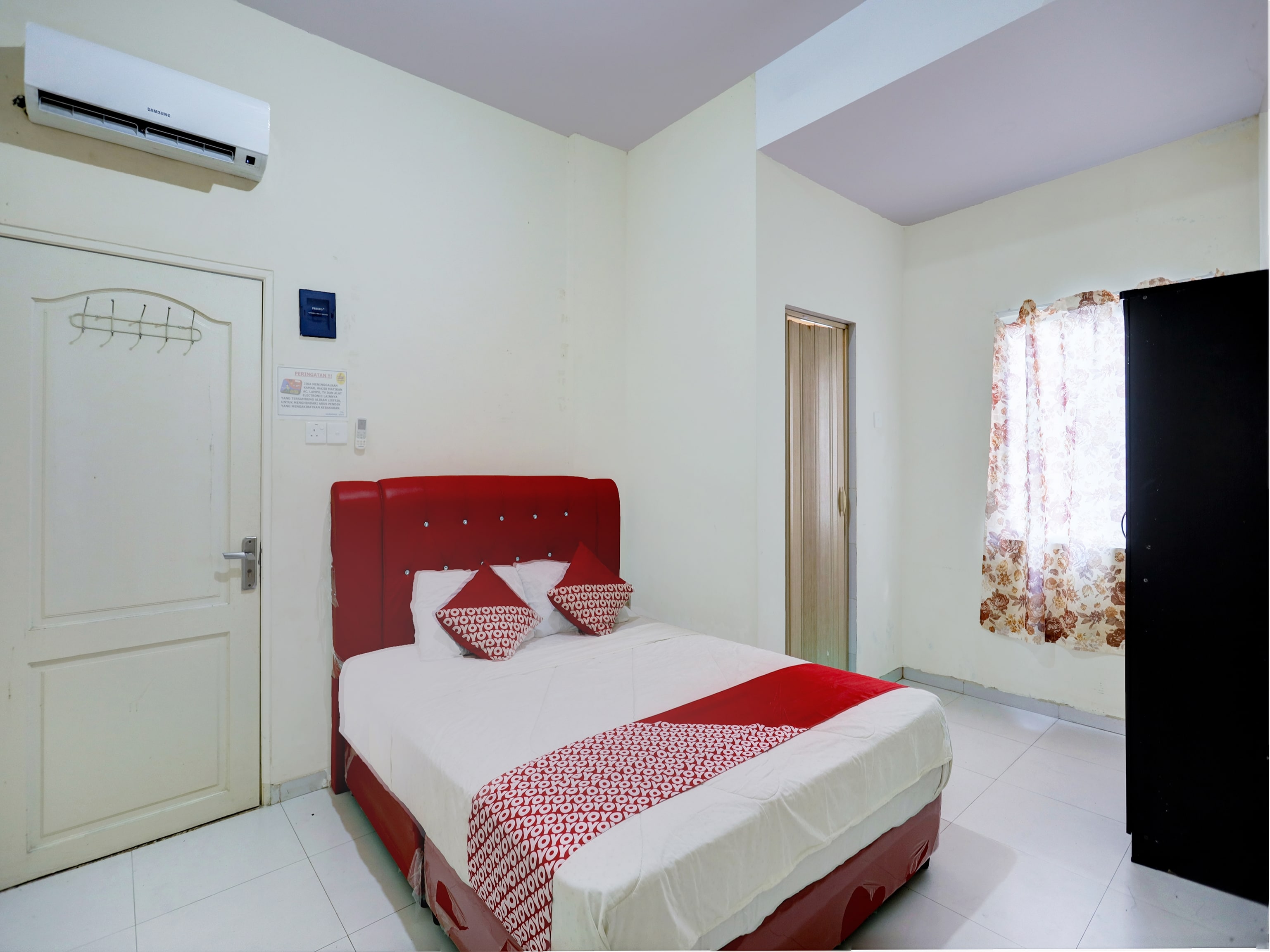 OYO 93130 Baloi Homestay - Tap to explore photos