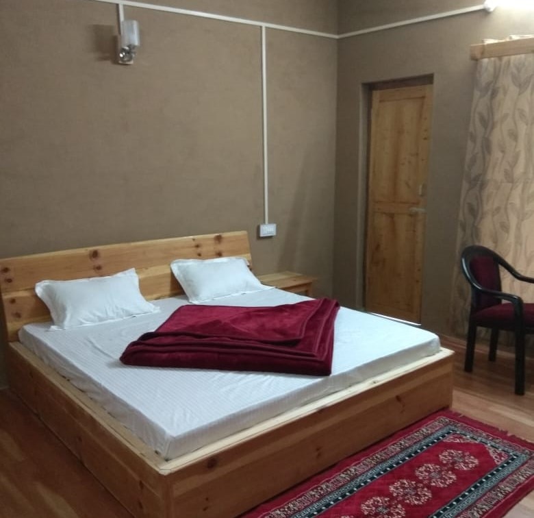Tirthan Travel Nest Homestay | Rooms & Caretaker - Tap to explore photos