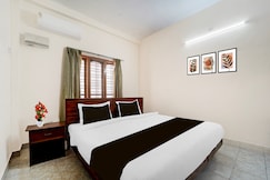 Super Hotel O Pathanamthitta Near Mahatma Gandhi Statue, Pathanamthitta